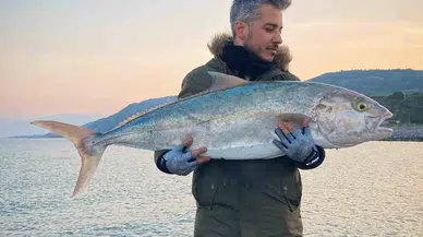 Tuttuğu Balığa O denli Sevindi Ki İzleyenleri Gülümsetti
