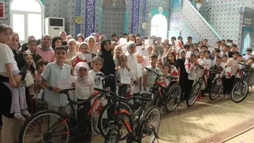 Gerze'de yaz Kur'an kursunda başarılı öğrencilere bisiklet hediye edildi