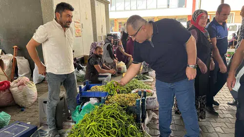 Ünlü, Pazarcılarla Bir Araya Geldi